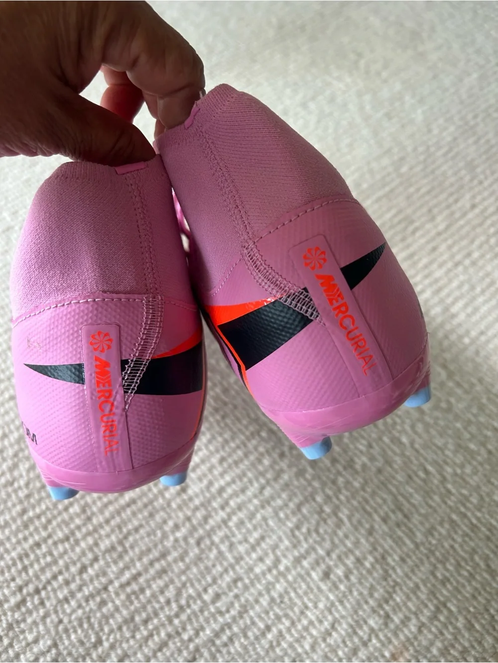Nike Women’s Pink Sneakers with Orange Swoosh